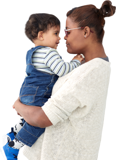 Happy woman holding on her back a baby with her arms raised